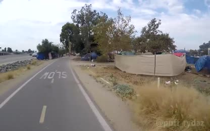 Riding through the Homeless Camps in Anaheim California on the Santa Ana River Trail